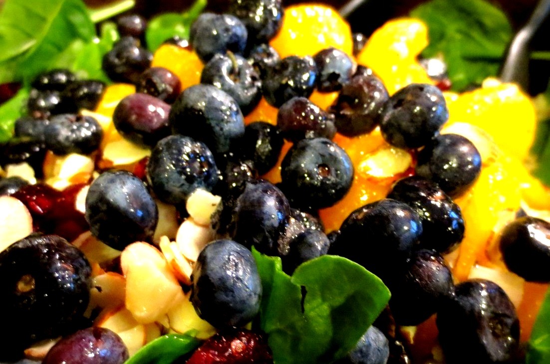 A delicious summer salad my family makes. Spinach with blueberries, craisins, mandarin oranges, and slivered almonds. Topped with a homemade dressing.More at secretsofanamateurchef.tumblr.com